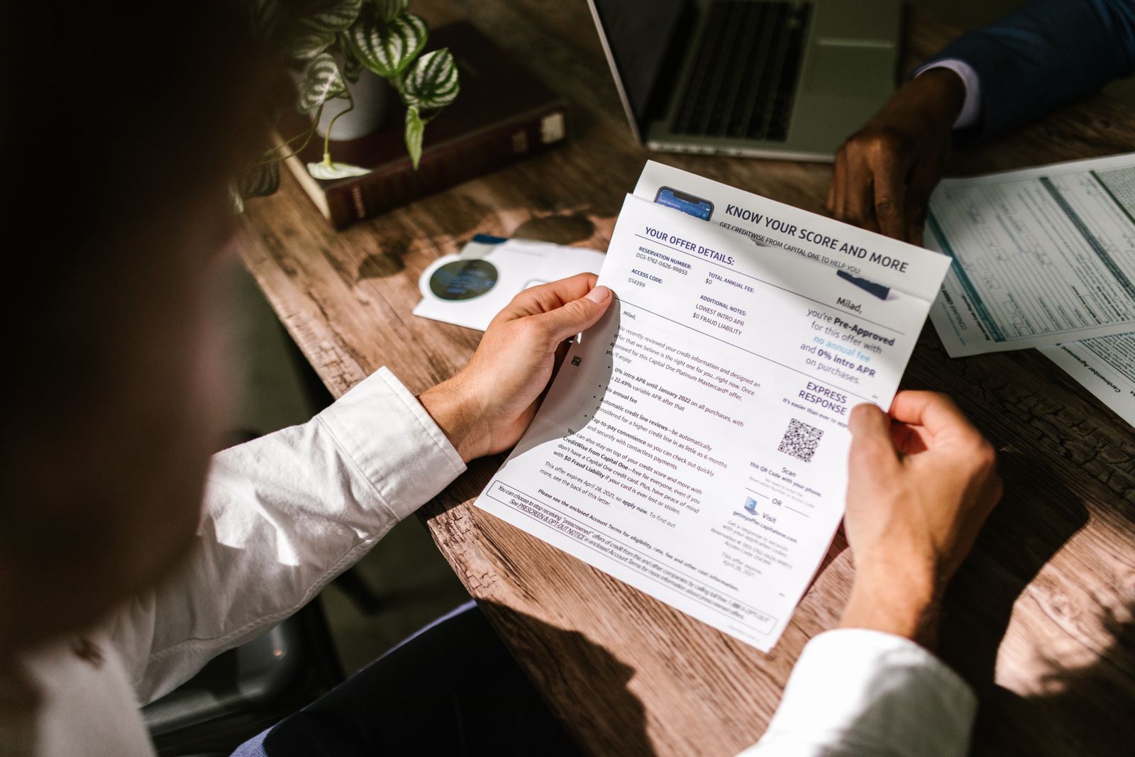 A lease worksheet being reviewed at a desk